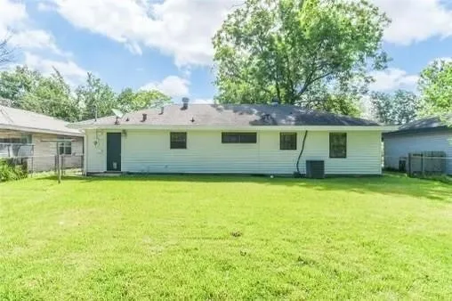 front view of a house with a garden
