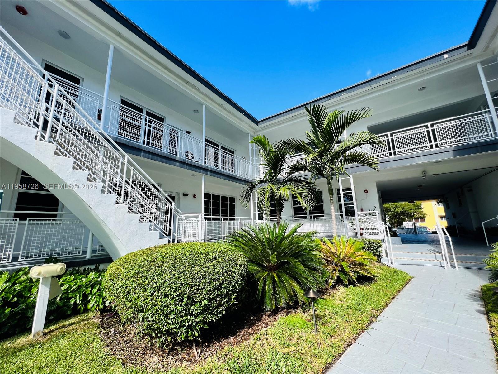 960 Bay Drive, Unit 902 Miami Beach, FL 33141 - Photo 21 of 25 a view of a house with a patio