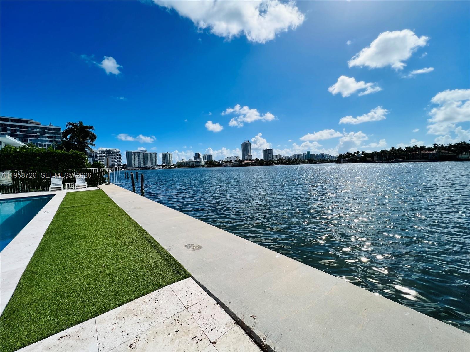 960 Bay Drive, Unit 902 Miami Beach, FL 33141 - Photo 24 of 25 a view of a lake with a big yard