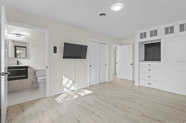 a view of a livingroom with wooden floor