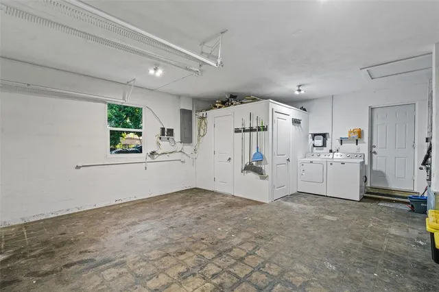 a view of a kitchen with a refrigerator and a stove