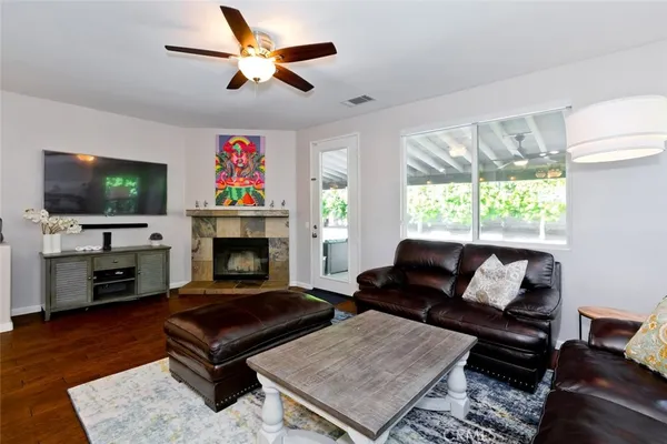 a living room with furniture and a window