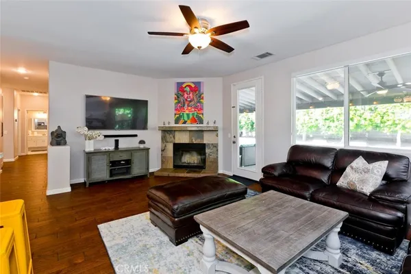 a room with furniture and flat screen tv