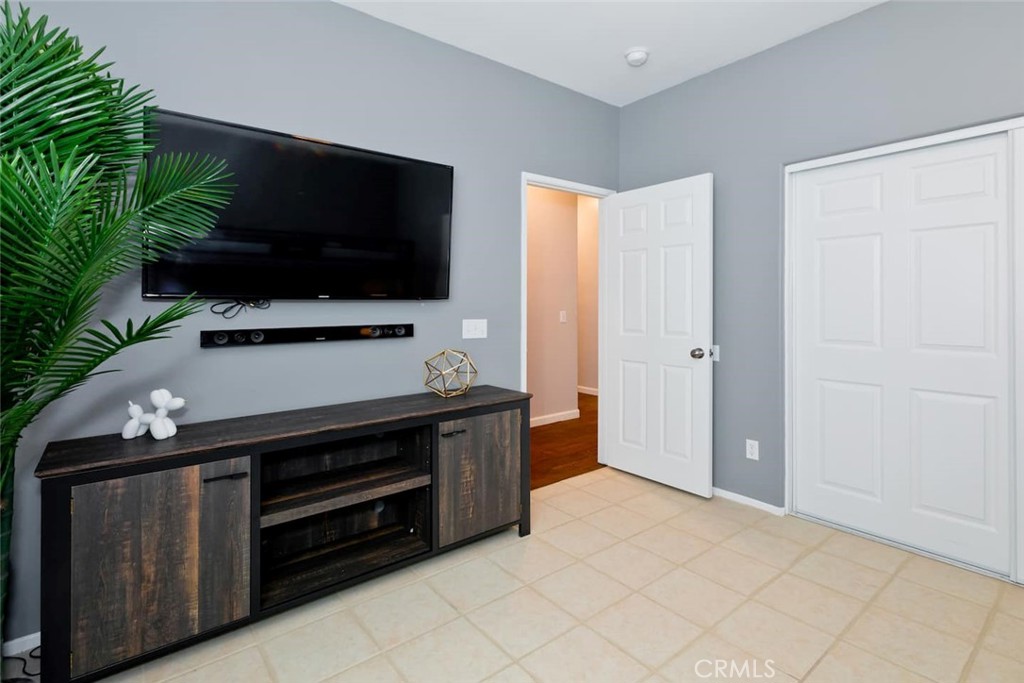 80750 Diamondback Trail Indio, CA 92201 - Photo 16 of 67 a room with furniture and flat screen tv