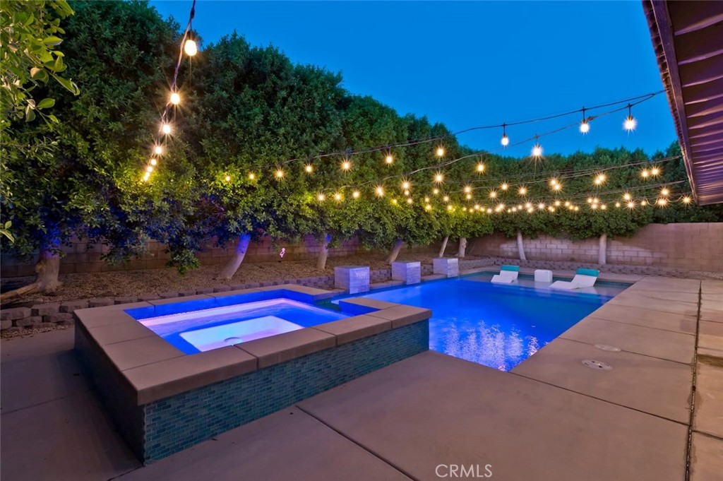 80750 Diamondback Trail Indio, CA 92201 - Photo 56 of 67 a view of a backyard with swimming pool