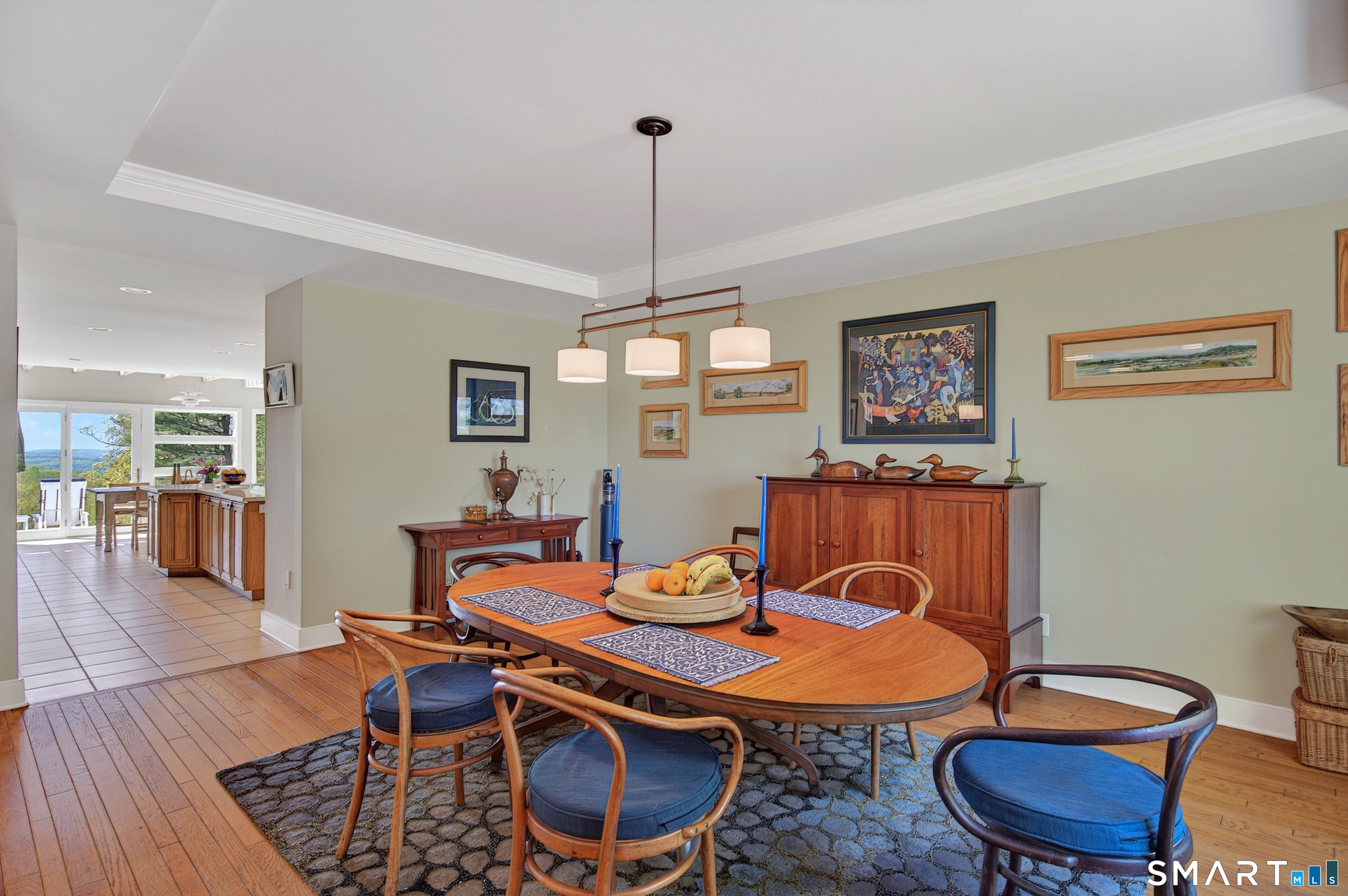140 2nd Hill Road Bridgewater, CT 06752 - Photo 17 of 40 a view of a dining room with furniture wooden floor and chandelier