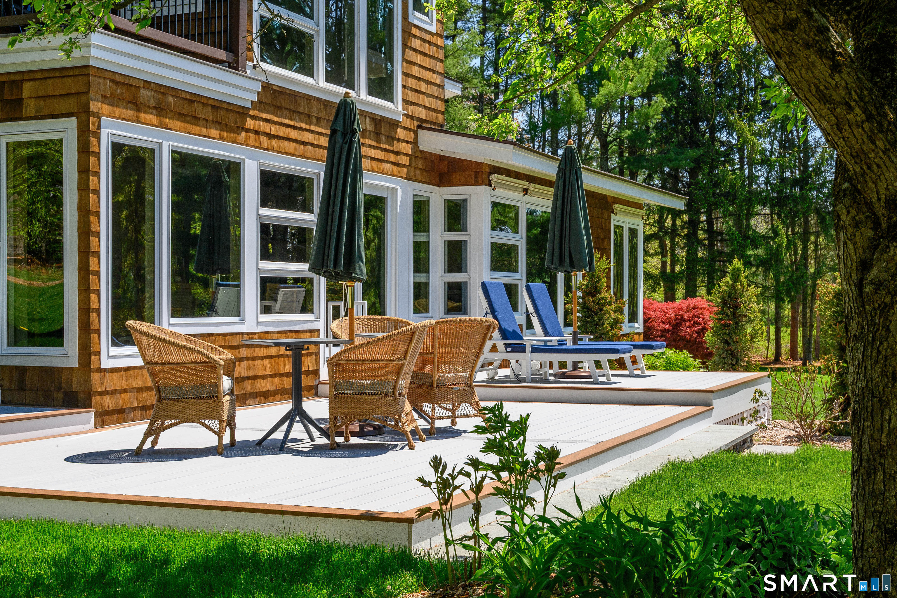 140 2nd Hill Road Bridgewater, CT 06752 - Photo 21 of 40 a view of a house with sitting area and garden