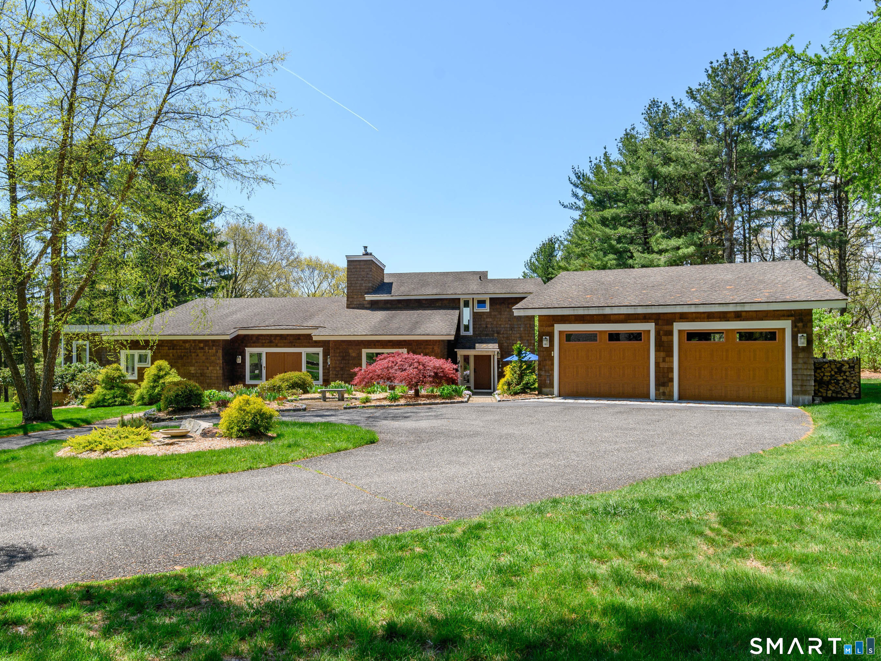 140 2nd Hill Road Bridgewater, CT 06752 - Photo 3 of 40 a front view of house with yard and green space