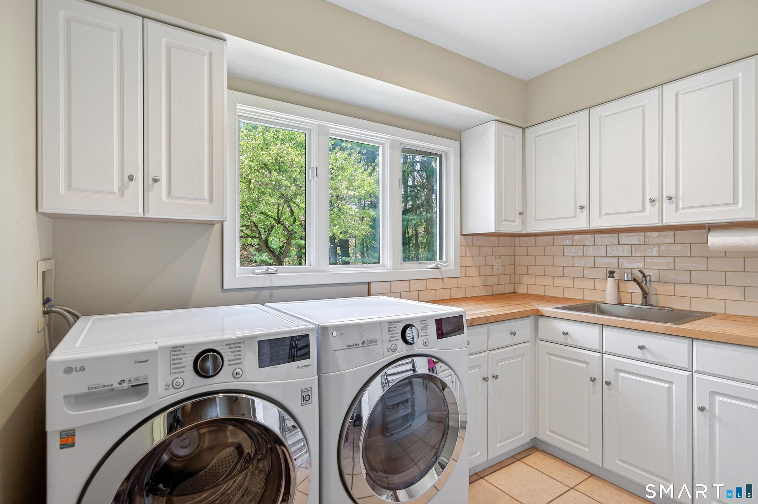 140 2nd Hill Road Bridgewater, CT 06752 - Photo 31 of 40 a utility room with sink dryer and washer