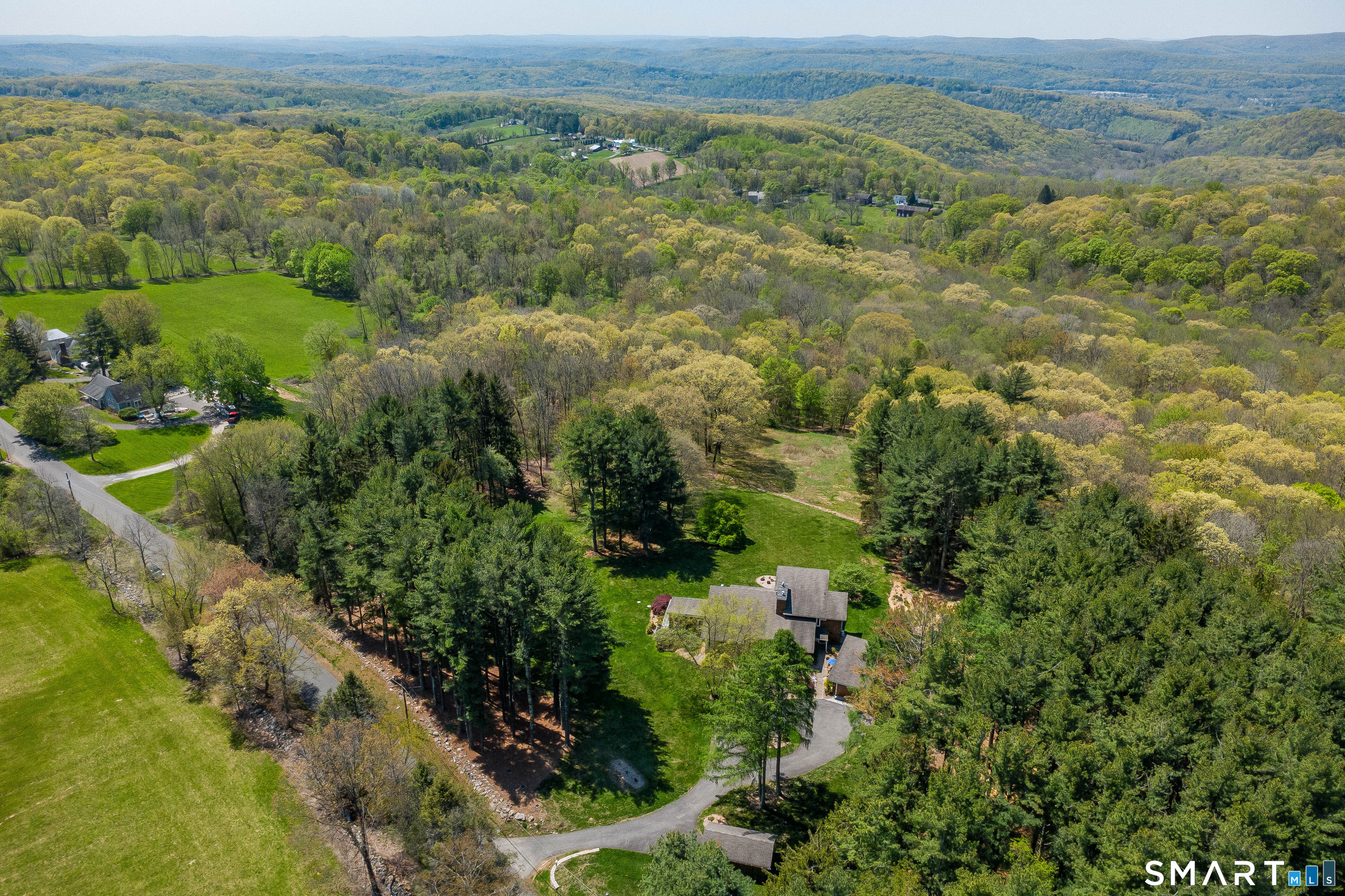 140 2nd Hill Road Bridgewater, CT 06752 - Photo 35 of 40 a view of a lush green field