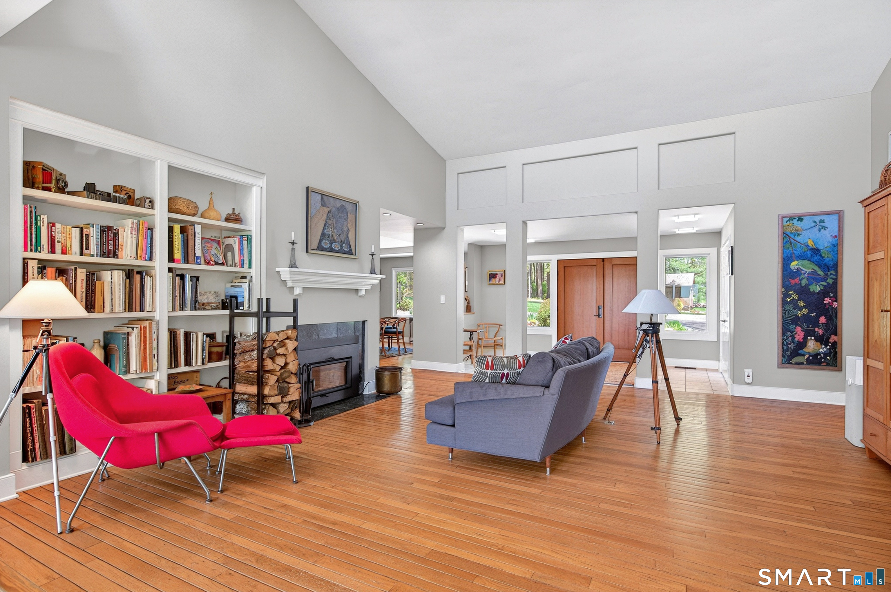 140 2nd Hill Road Bridgewater, CT 06752 - Photo 7 of 40 a living room with furniture hard wood floor and a book shelf