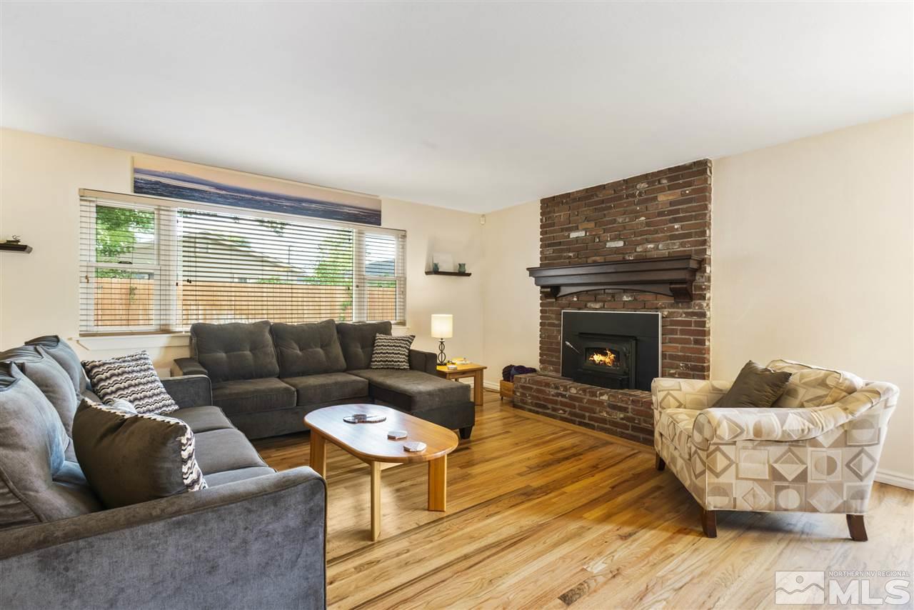 1545 Elizabeth Street Reno, NV 89509 - Photo 4 of 21 a living room with furniture and a fireplace