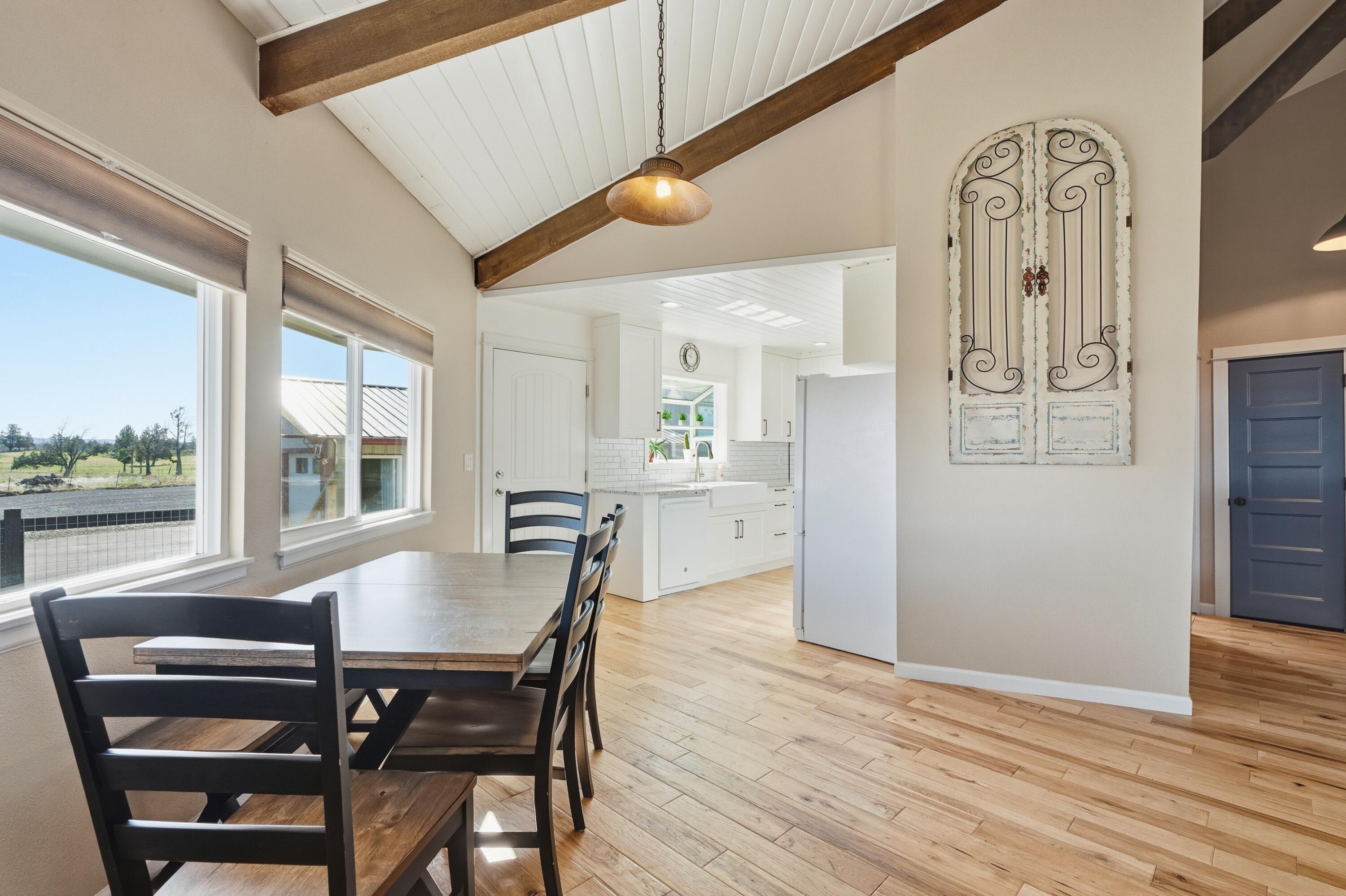 4074 Southwest Reif Road Powell Butte, OR 97753 - Photo 7 of 59 a dining room with furniture and window