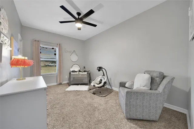 a bathroom with a sink a large mirror and a bathtub