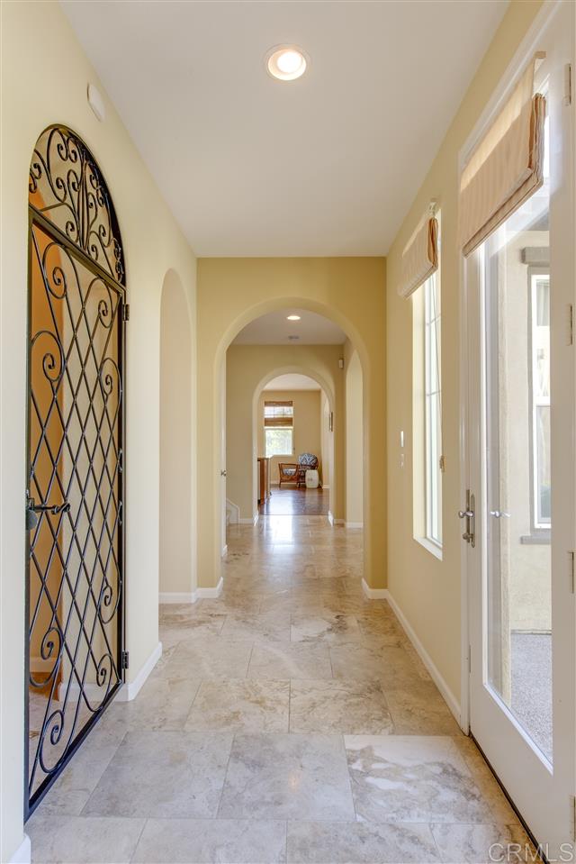 2394 Lapis Road Carlsbad, CA 92009 - Photo 3 of 25 Entrance hallway with travertine floors