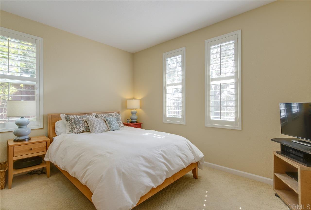2394 Lapis Road Carlsbad, CA 92009 - Photo 8 of 25 Downstairs bedroom with attached full bathroom