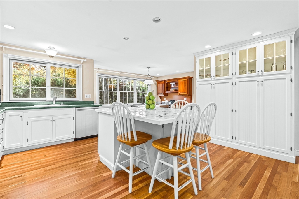 111 Pilgrim Road Wellesley, MA 02481 - Photo 7 of 21 a dining room with furniture a window and wooden floor
