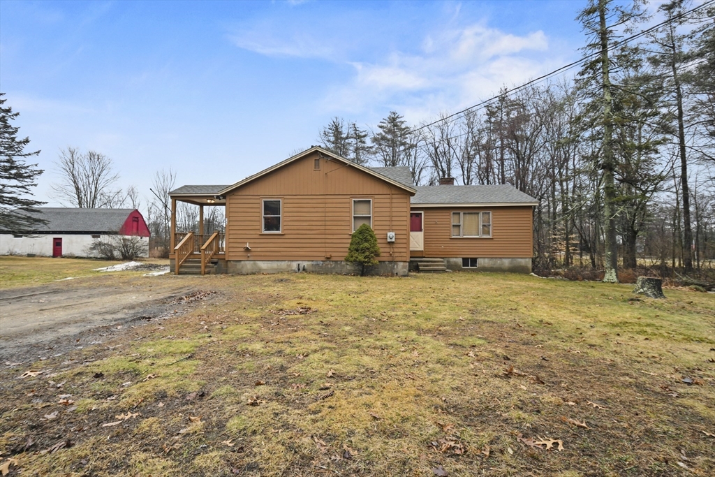 148 Lunenburg Road Townsend, MA 01474 - Photo 1 of 26 a view of a house with a yard