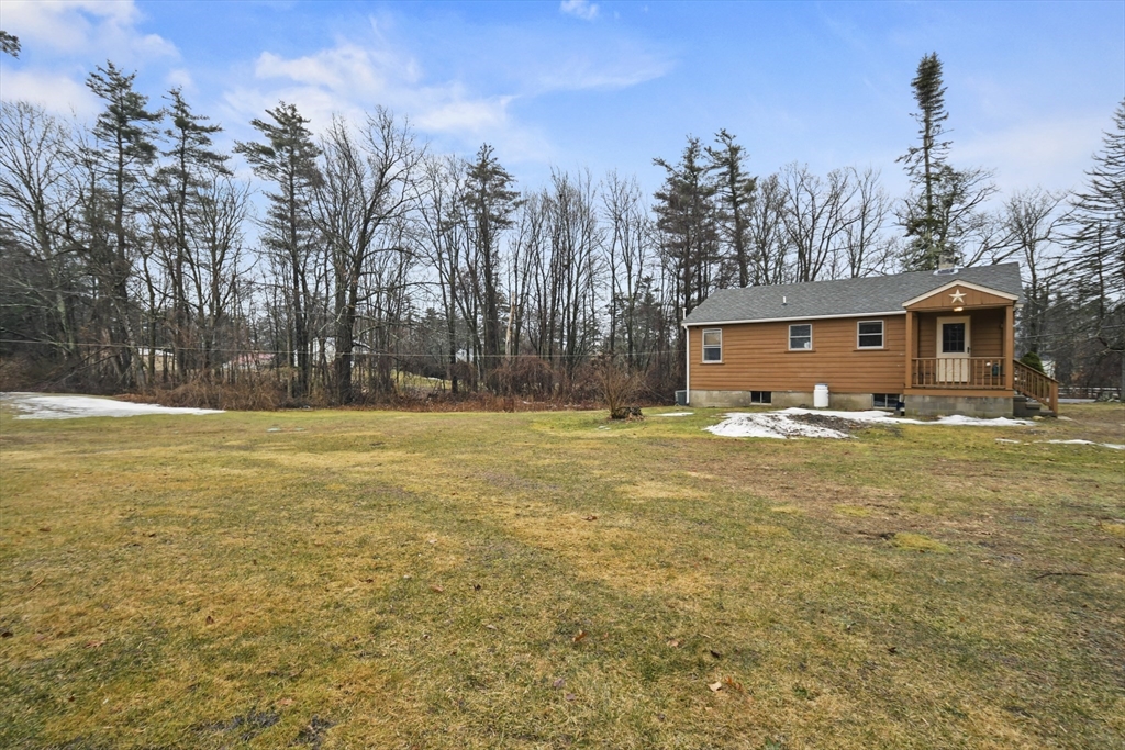 148 Lunenburg Road Townsend, MA 01474 - Photo 2 of 26 a view of a house with a yard and tree s