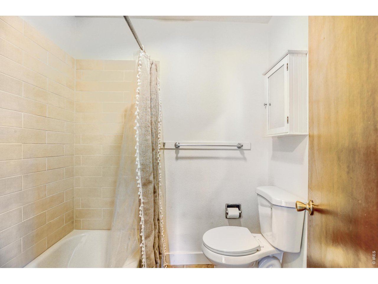 4690 Portside Way Boulder, CO 80301 - Photo 12 of 18 a bathroom with a granite countertop shower and a toilet