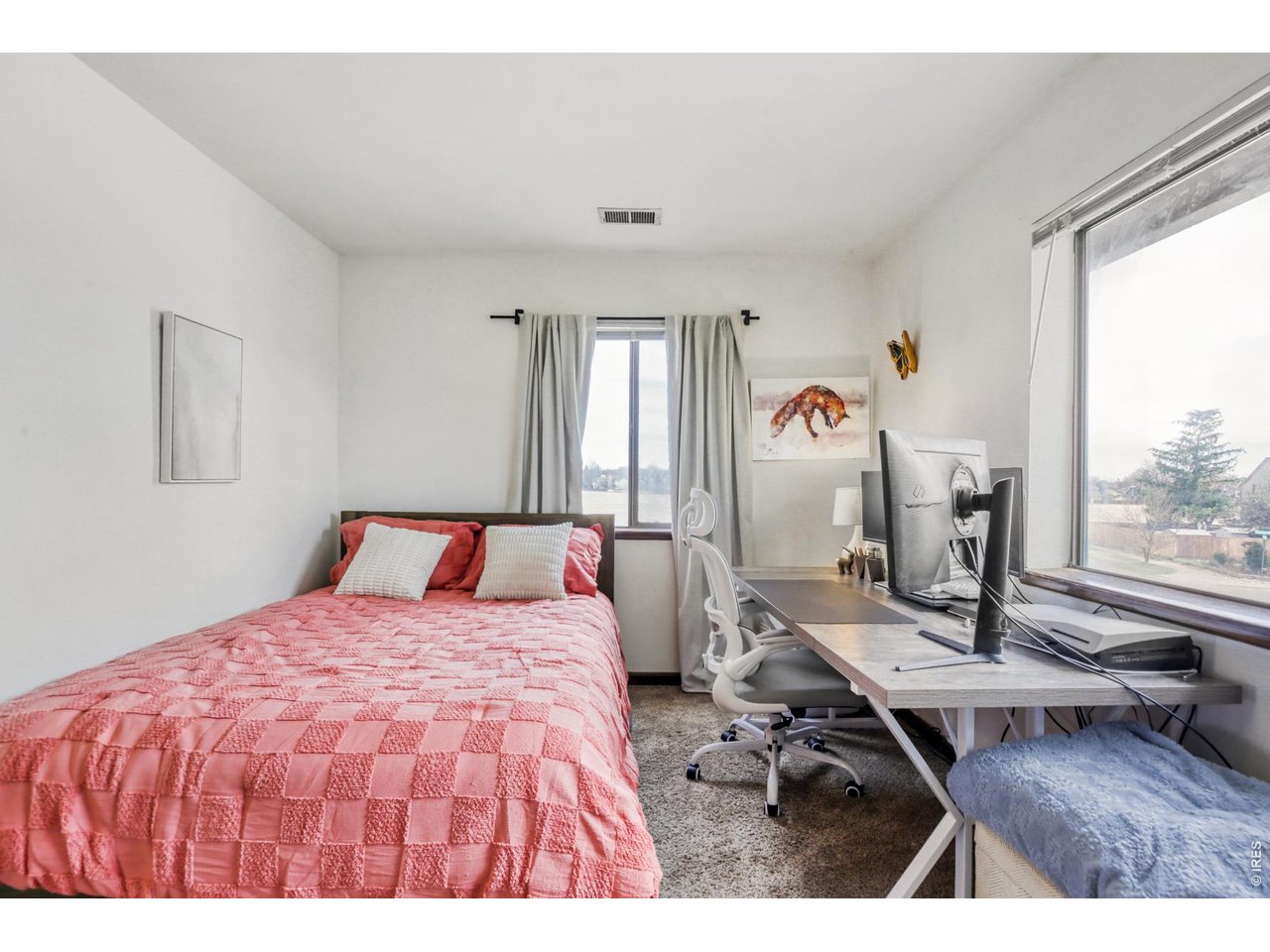 4690 Portside Way Boulder, CO 80301 - Photo 14 of 18 a bed room with a bed and a table