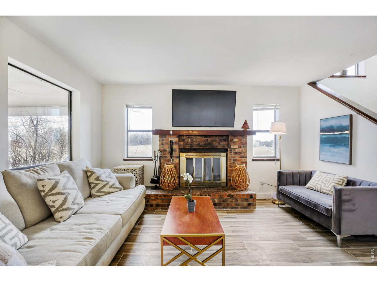 4690 Portside Way Boulder, CO 80301 - Photo 3 of 18 a living room with furniture and a flat screen tv
