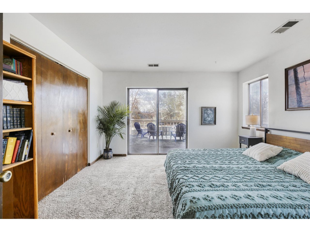 4690 Portside Way Boulder, CO 80301 - Photo 9 of 18 a bedroom with a large bed and a large window