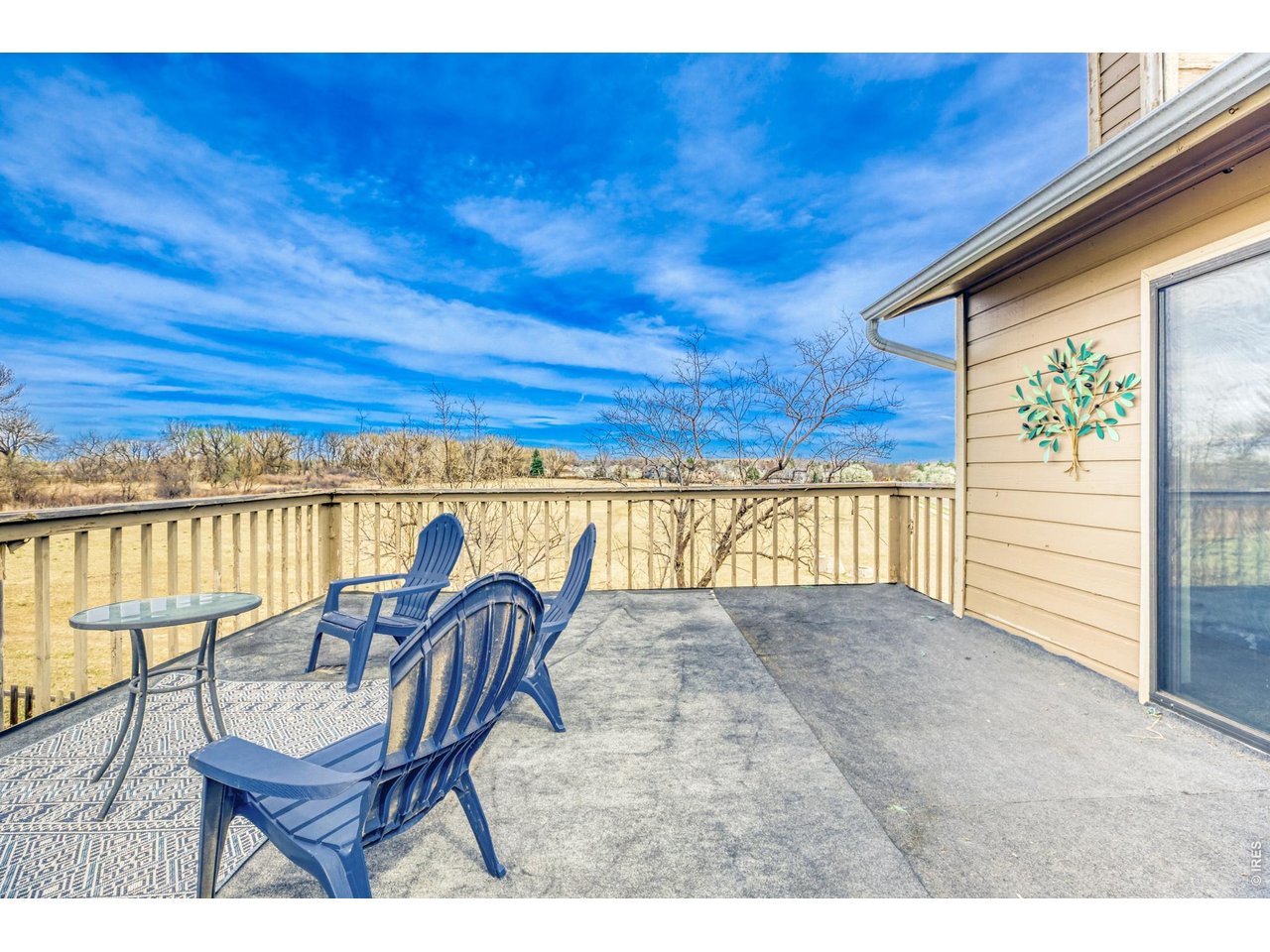 4690 Portside Way Boulder, CO 80301 - Photo 10 of 18 a view of a patio with wooden floor and seating space