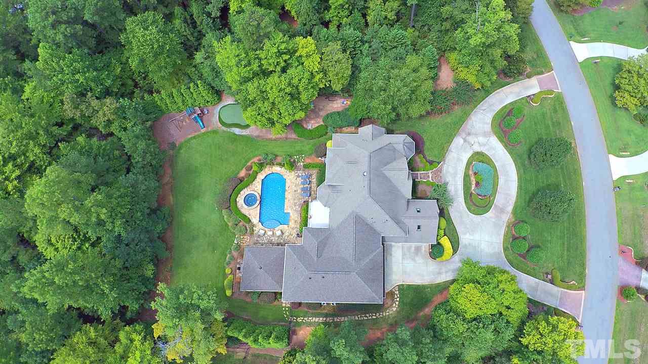 1608 Sharnbrook Court Raleigh, NC 27614 - Photo 2 of 30 Private, 1-of-a-kind, recently renovated. Seperate In-Law/Guest ste, saltwater Pool w/Hot tub, stone surround, lush landscape, Outdoor resort-like gazebo Kitchen w/ grill; New Master Wing. 4 car garage