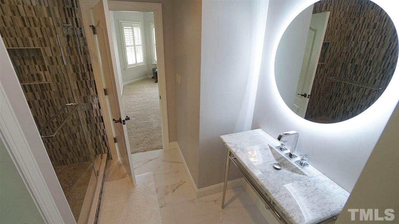 1608 Sharnbrook Court Raleigh, NC 27614 - Photo 21 of 30 Most bathrooms have been updated with top of line material in a modern style