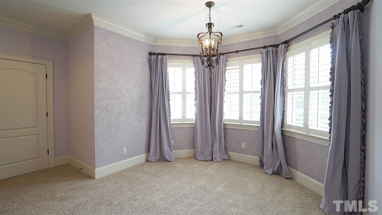 1608 Sharnbrook Court Raleigh, NC 27614 - Photo 24 of 30 Oversized guest bedroom, with jack and jill bathroom, good closet space, and bay window