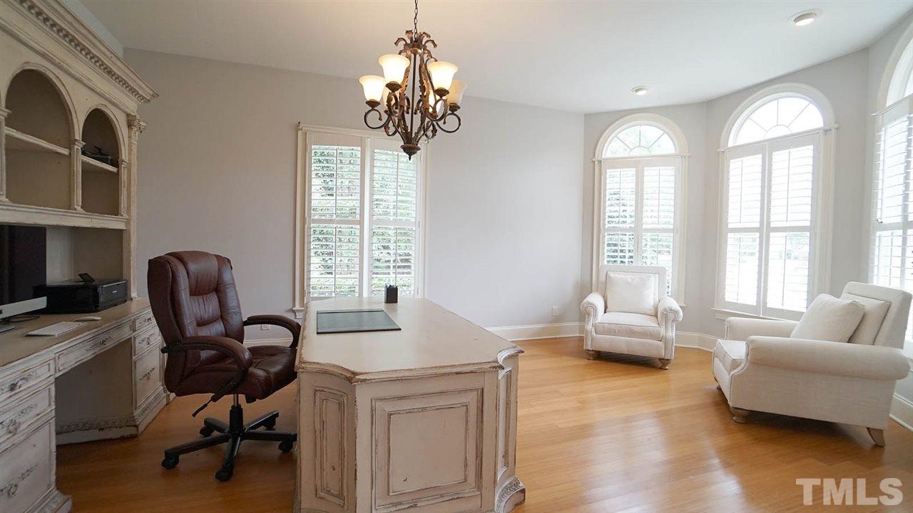 1608 Sharnbrook Court Raleigh, NC 27614 - Photo 26 of 30 Huge office (or formal living room), light filled with plantation shutters and bamboo flooring,