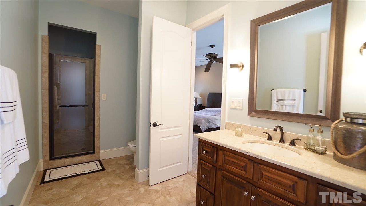 1608 Sharnbrook Court Raleigh, NC 27614 - Photo 29 of 30 Conveniently located off the back covered porch with easy access from the pool. Or access via private nanny suite