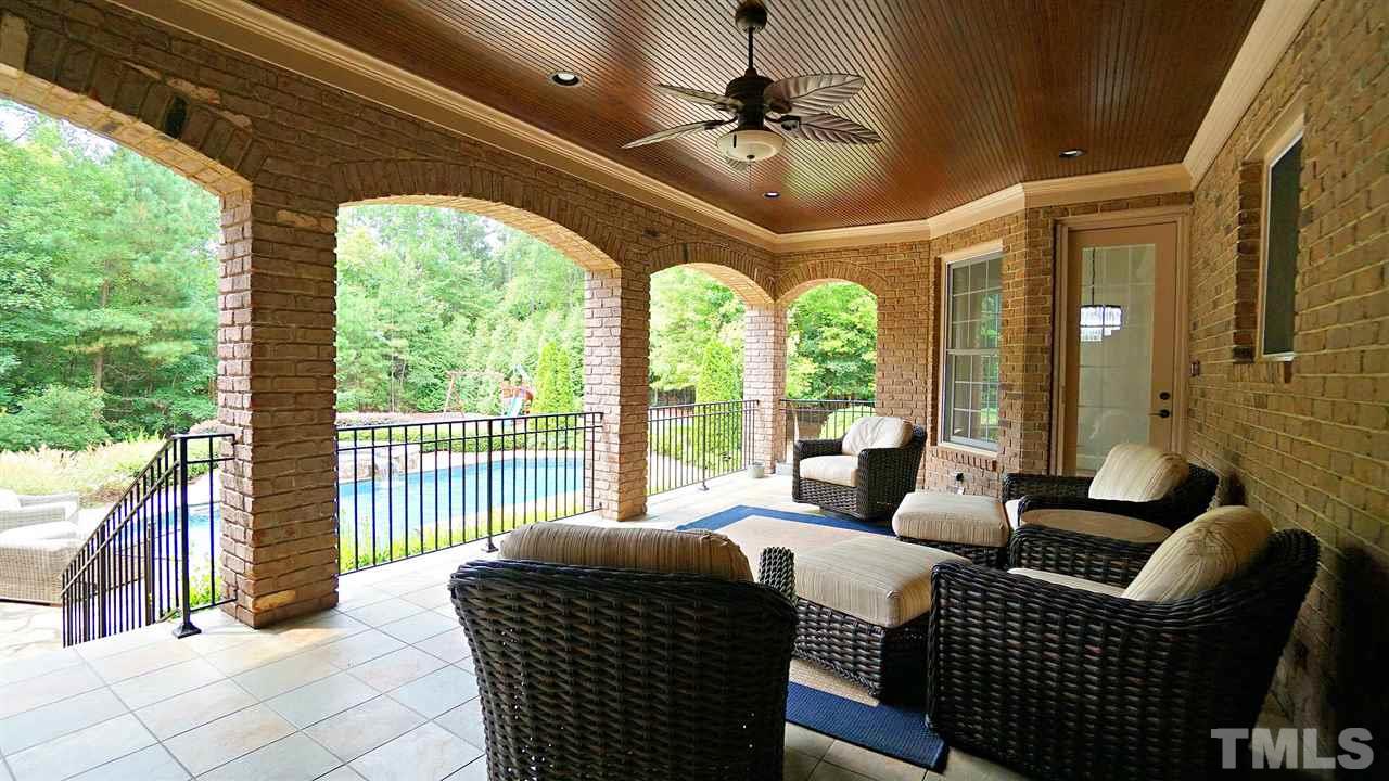 1608 Sharnbrook Court Raleigh, NC 27614 - Photo 6 of 30 Stained bead board ceiling, surround sound, tile floor overlooking amazing backyard