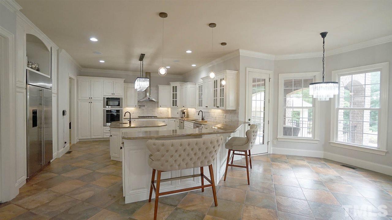1608 Sharnbrook Court Raleigh, NC 27614 - Photo 10 of 30 Chef's gourmet kitchen w/ top of line appliances, tastefully renovated.