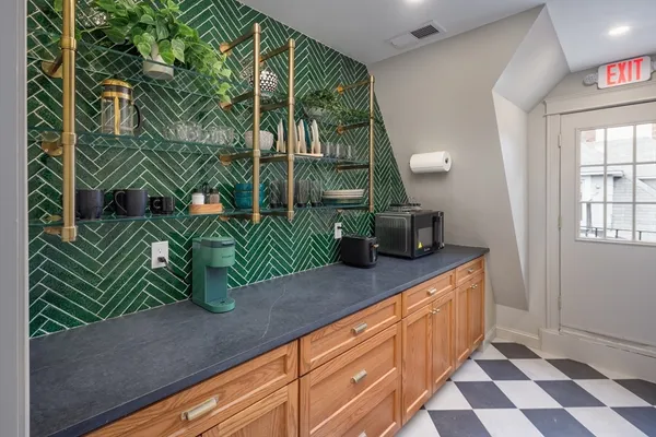 a stairs of a house with wooden floor in front of it