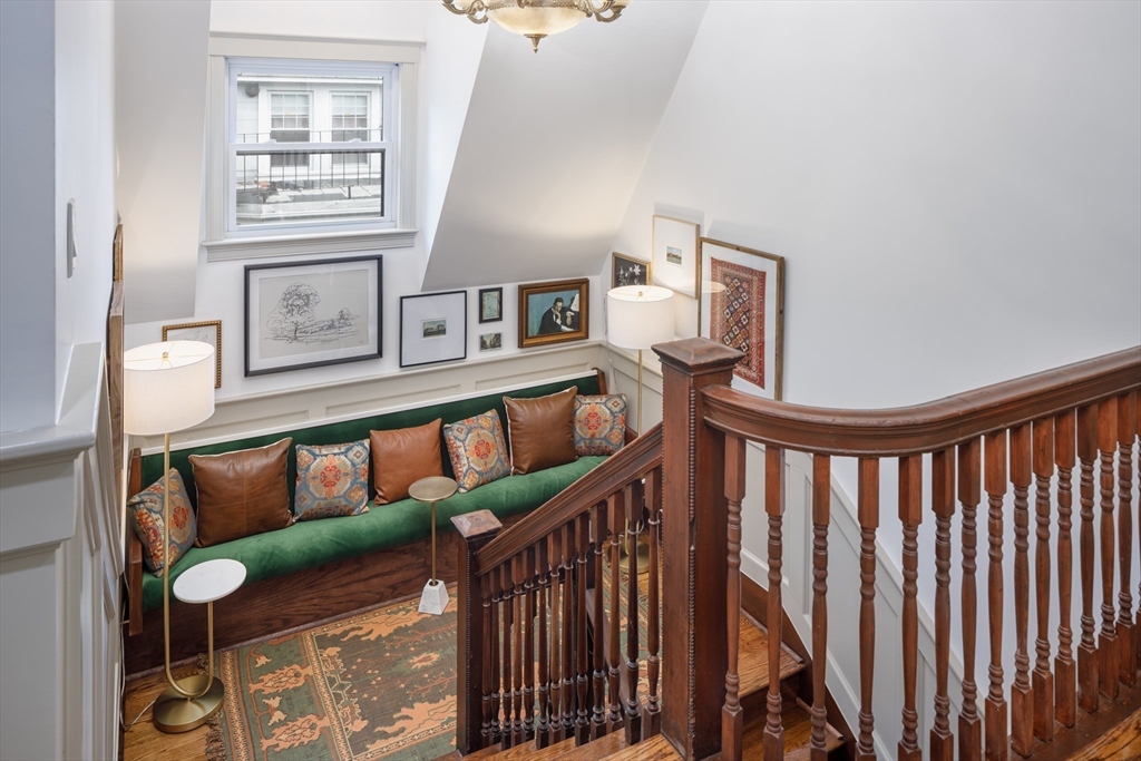 44 Winslow Road Brookline, MA 02446 - Photo 20 of 35 a stairs of a house with wooden floor in front of it