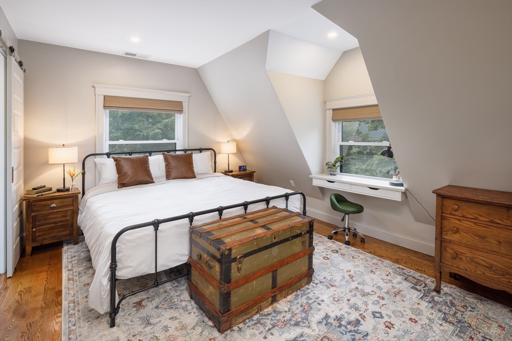 44 Winslow Road Brookline, MA 02446 - Photo 31 of 35 a bedroom with furniture and a window