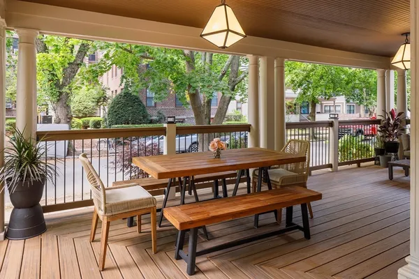 a room with a couch and a rug