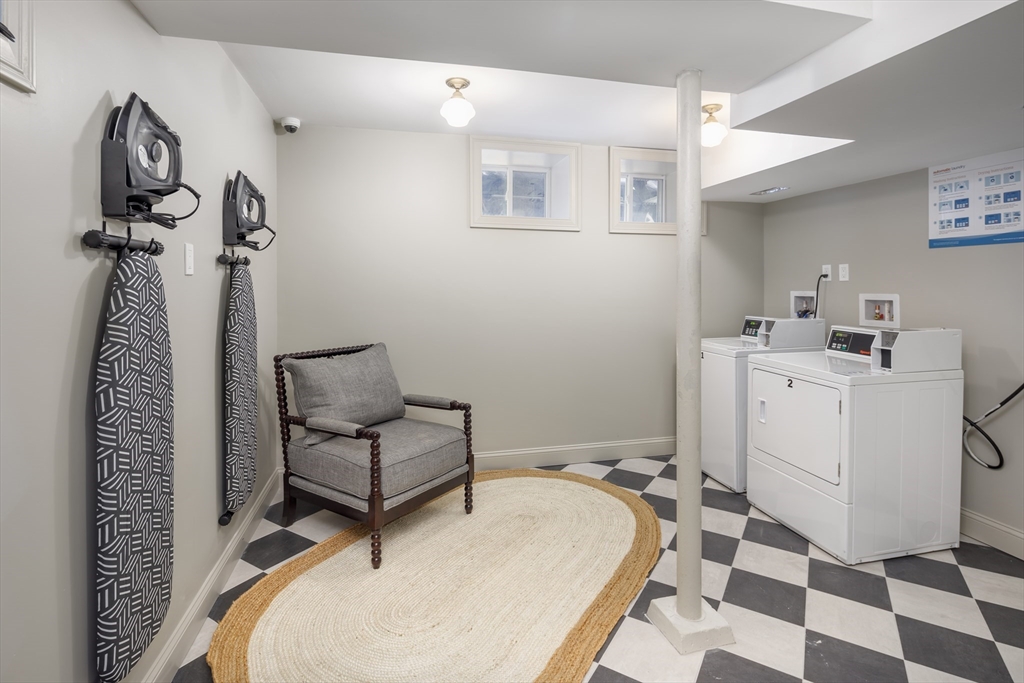 44 Winslow Road Brookline, MA 02446 - Photo 35 of 35 a room with a couch and a rug