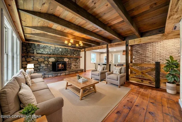 a view of a bathroom with wooden floor
