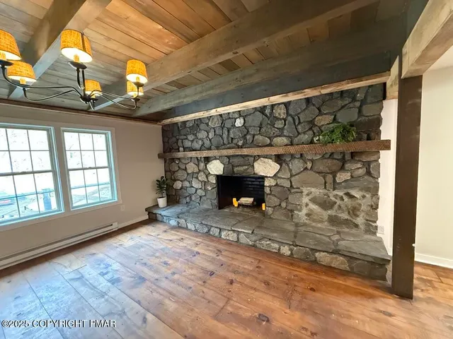 a bathroom with a toilet and a bathtub