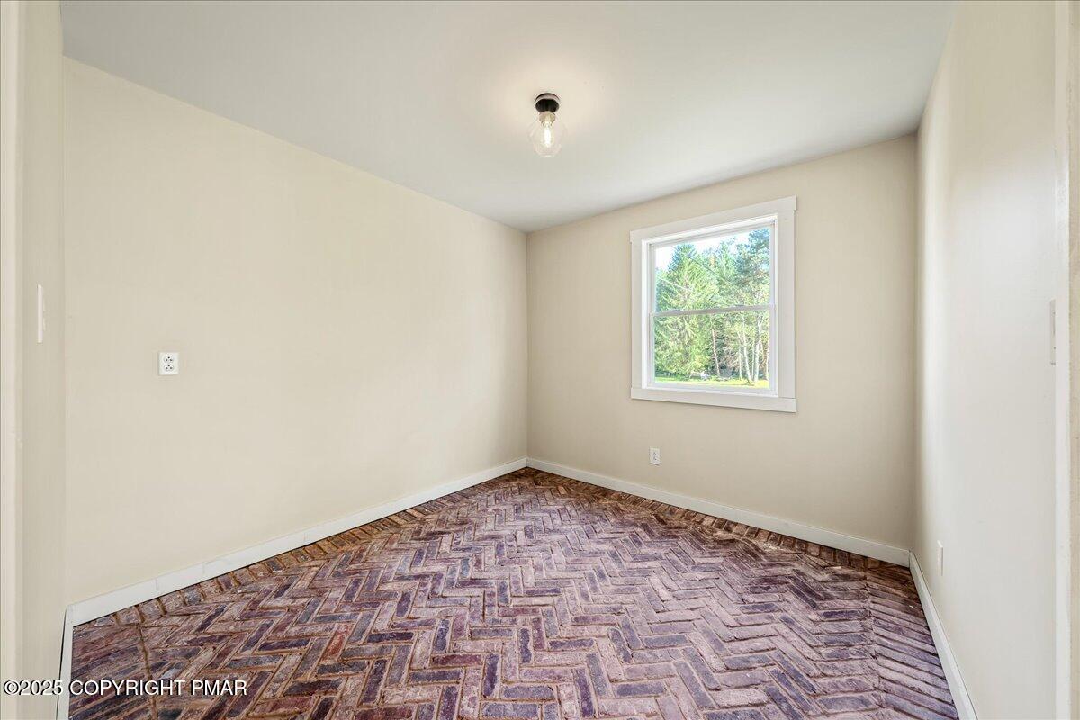 262 Lower Swiftwater Road Cresco, PA 18326 - Photo 21 of 50 an empty room with a window