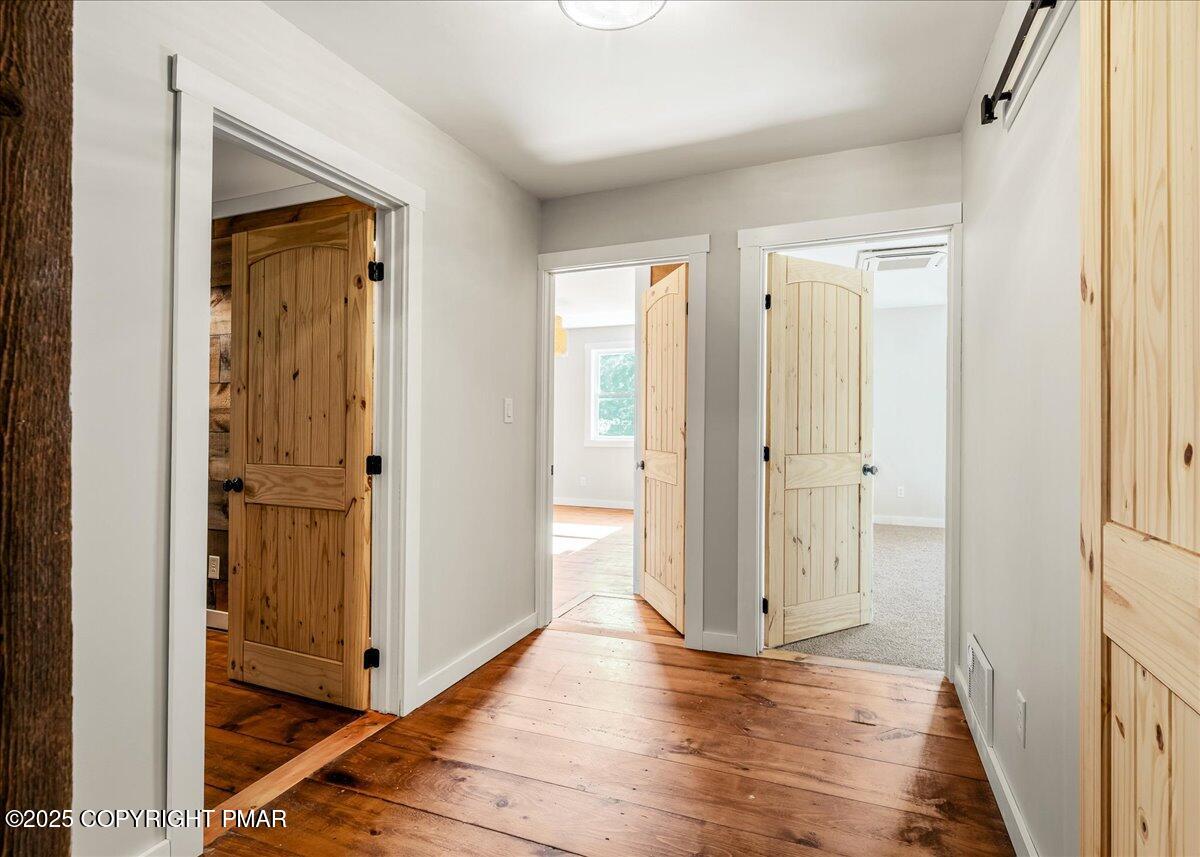 262 Lower Swiftwater Road Cresco, PA 18326 - Photo 27 of 50 a view of a bathroom with wooden floor