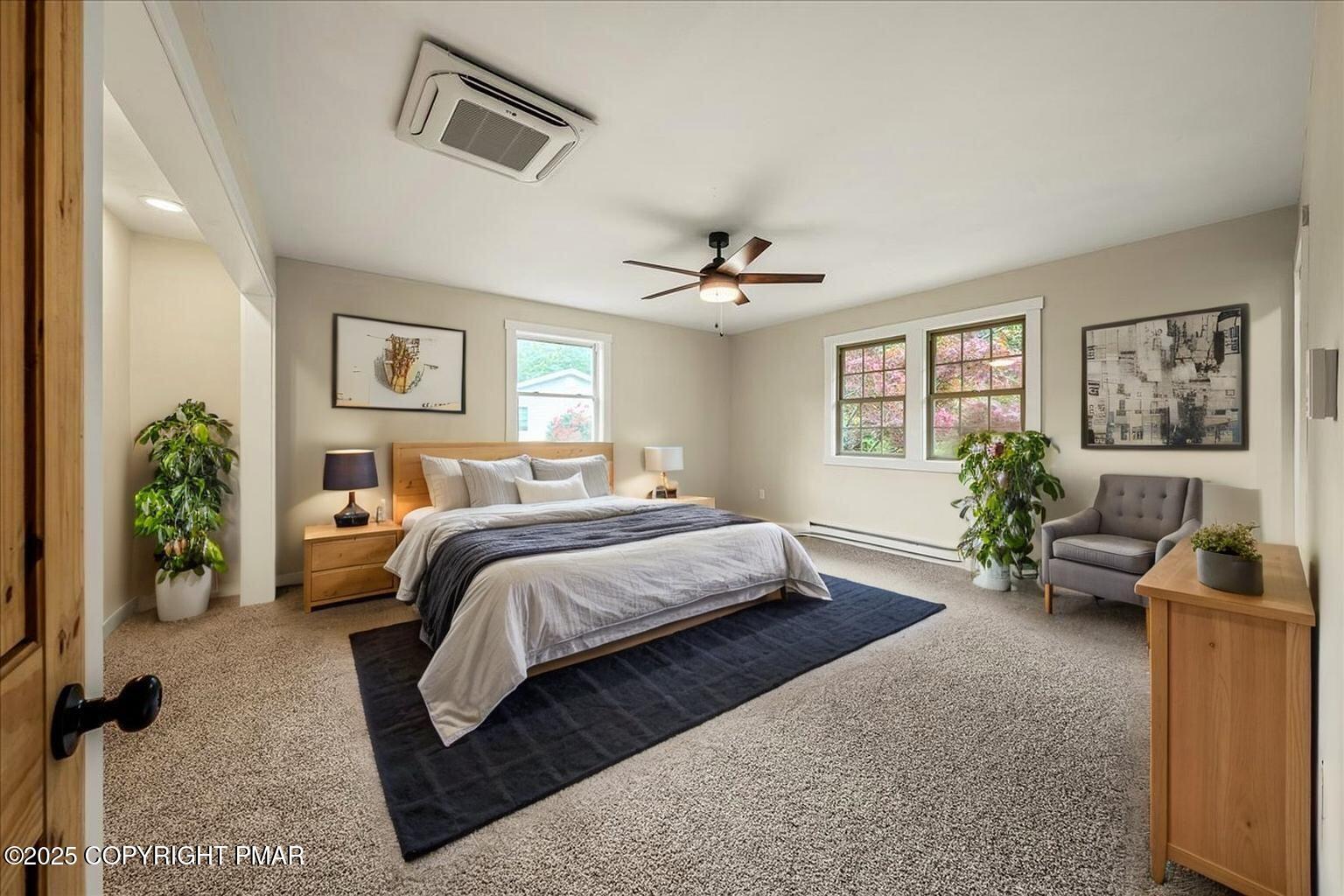 262 Lower Swiftwater Road Cresco, PA 18326 - Photo 31 of 50 a bedroom with a balcony furniture and a chandelier