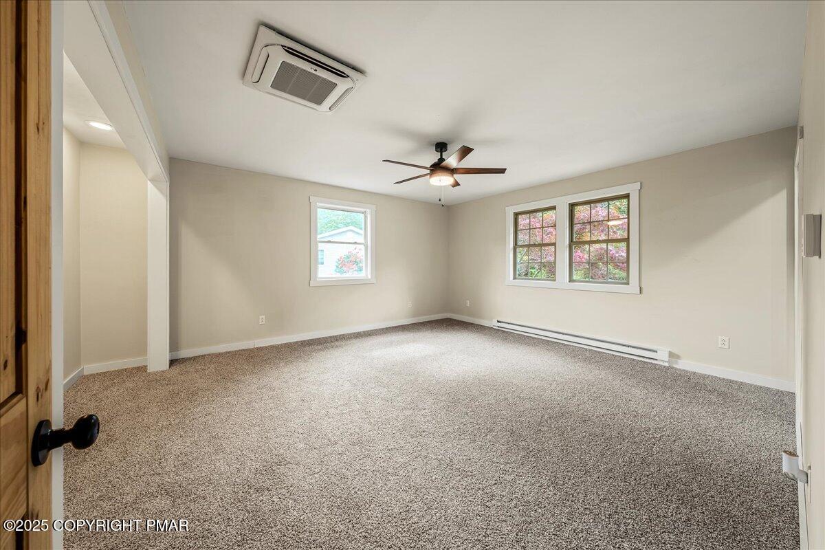262 Lower Swiftwater Road Cresco, PA 18326 - Photo 33 of 50 a view of an empty room with a window
