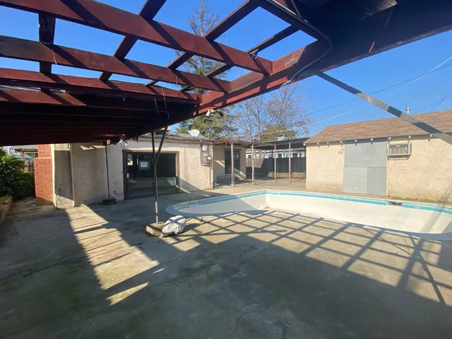 a view of a backyard of a house