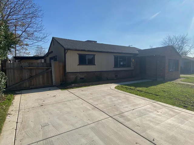 a house view with a backyard