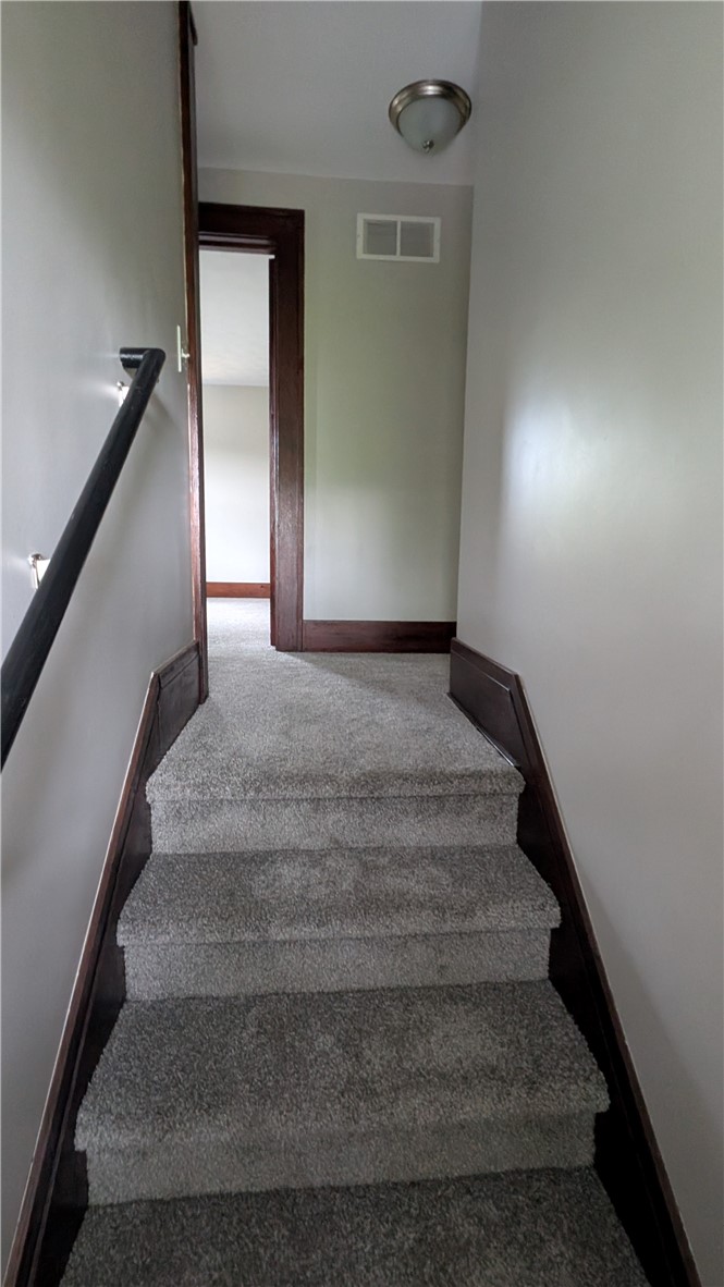22 Cherry Road Gates, NY 14624 - Photo 16 of 31 Stairway leading to 2nd floor, another set of stai