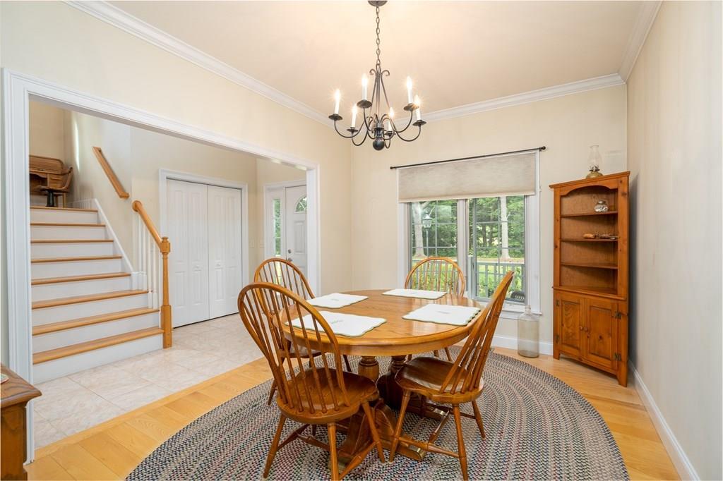 45 Gilbert Road Southampton, MA 01073 - Photo 13 of 36 a view of a dining room with furniture and wooden floor